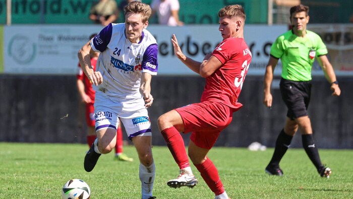 Saving the draw: Simon Zieher (left).