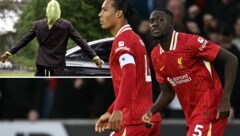 Ibrahima Konate (re. ohne, li. mit Maske) würde sich bei einem Streik beteiligen. (Bild: AFP/Paul ELLIS, FRANCK FIFE)