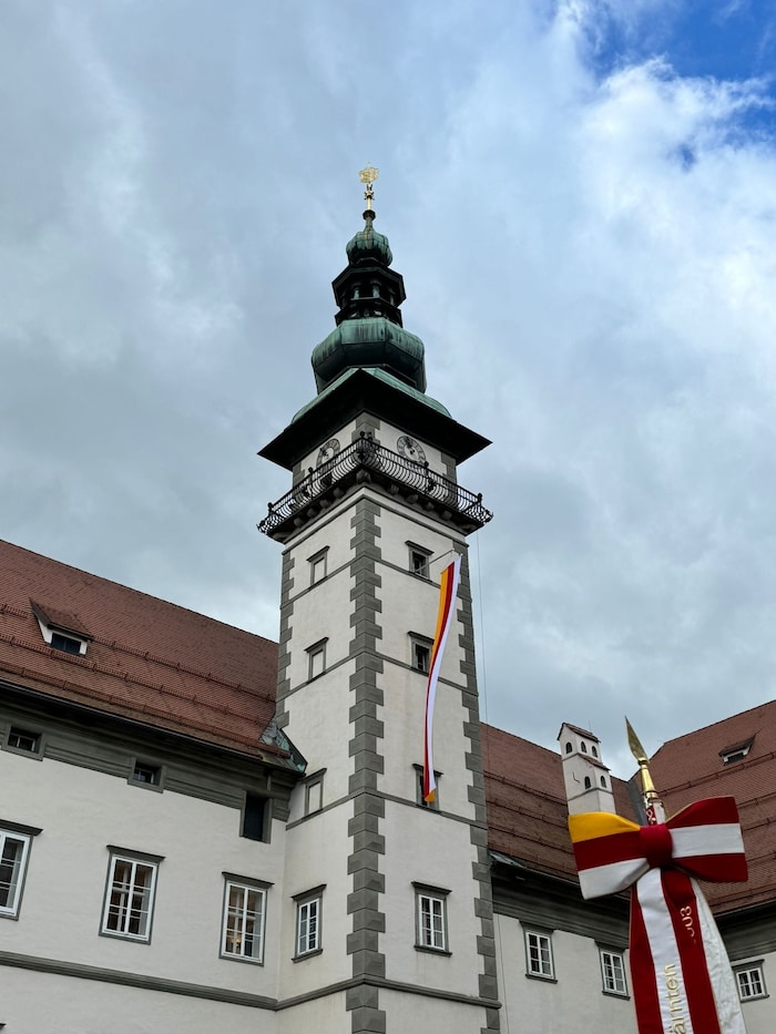 The Landhaus is decorated with the flags of Carinthia and Austria.