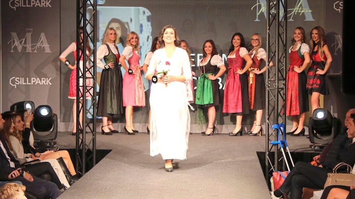 Cut a fine figure in a dirndl: 27-year-old Berfin Acikbas (center) and other motivated finalists ...