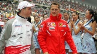 Ralf (l.) und Michael Schumacher (Bild: AFP/LIU JIN / AFP)