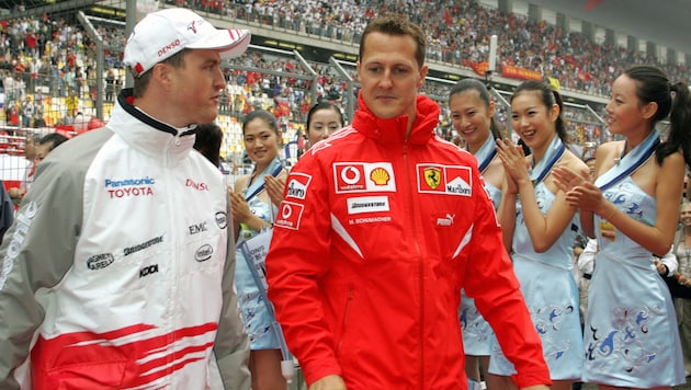 Ralf (l.) and Michael Schumacher (Bild: AFP/LIU JIN / AFP)