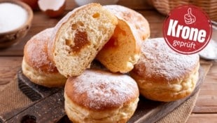 Gute Krapfen glänzen mit fluffigem Teig und schmackhafter Marmelade.
