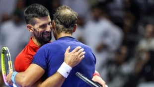 Novak Djokovic und Rafael Nadal (Bild: APA/AFP)