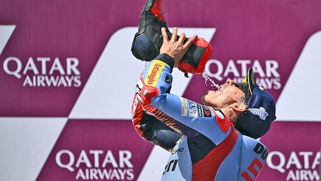 Cheers! Marc Marquez has earned his victory sip. (Bild: AAP IMAGE)