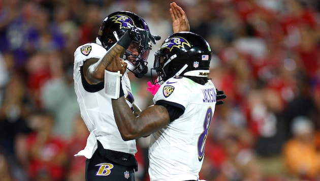 Großer Jubel bei Rashod Bateman und Lamar Jackson (Bild: AFP/APA/Getty Images via AFP/GETTY IMAGES/Mike Ehrmann)