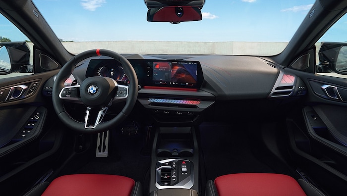 iDrive controller out, curved display in - the cockpit is completely new.