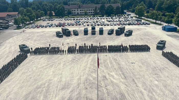 The parade ground and parking lot of the barracks are now covered with gravel.