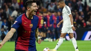 Während Robert Lewandowski (li.) jubelte, erlebte Kylian Mbappe einen rabenschwarzen Abend.