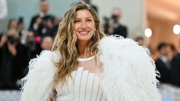 Top model Gisele Bündchen is looking forward to having children again after the end of her marriage to Tom Brady. (Bild: APA/AFP/Angela WEISS)