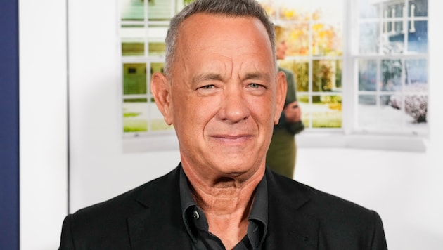 Tom Hanks talks about his childhood and why his parents' divorce was a good thing. (Bild: APA/Chris Pizzello/Invision/AP)