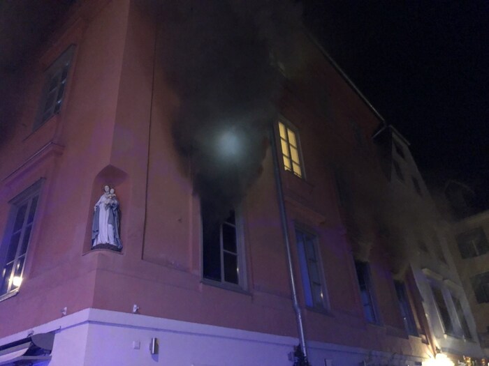 Smoke was coming from the second floor.