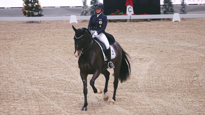 Diana Porsche with her current top horse "Dahoud"