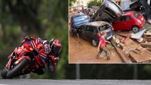 Schwere Unwetterschäden in Spanien: Francesco Bagnaia (re.) drohte mit Streik. (Bild: APA/AFP/Lillian SUWANRUMPHA, Associated Press)