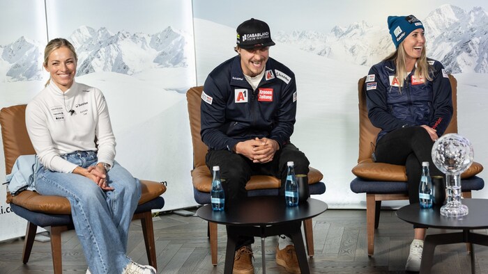 Gut-Behrami (left) and Hütter (right) laughed along with Feller (center).