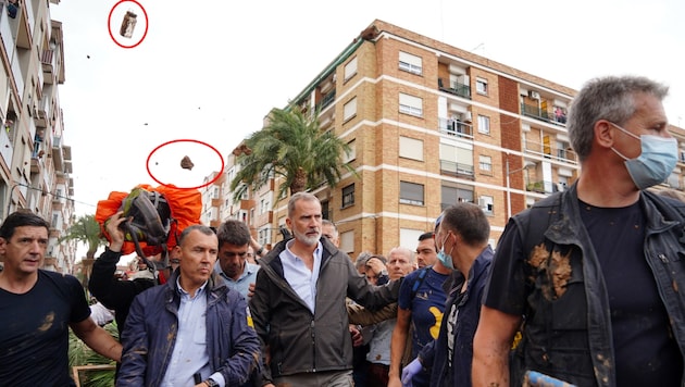 King Felipe VI and his wife Letizia are certainly used to more hospitality than they received in Paiporta ... (Bild: AFP, Krone KREATIV)