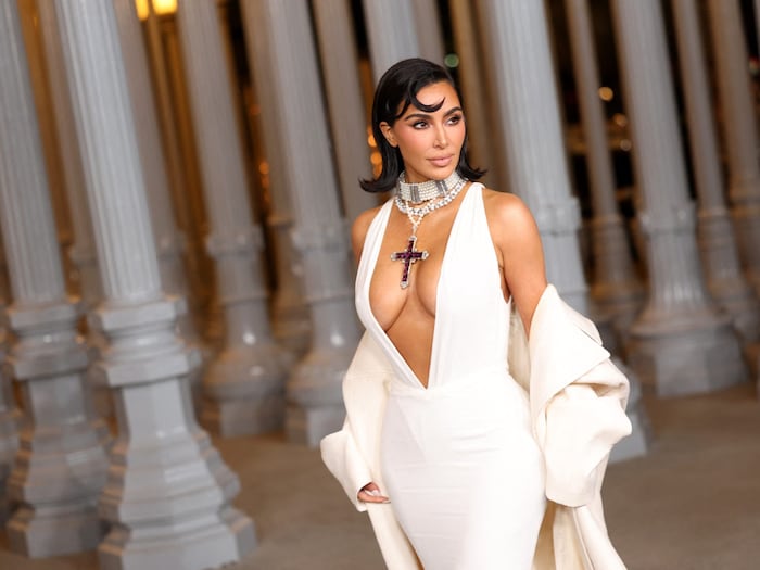 Kim Kardashian with Diana's cross necklace
