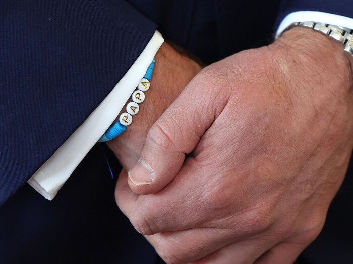 The heir to the British throne had a friendship bracelet with the word "Papa" on his wrist. His ...