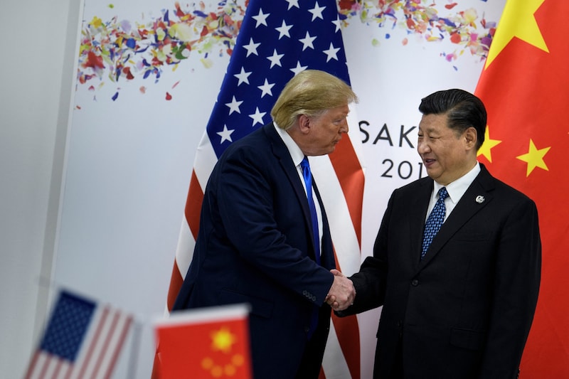 Werden sich wieder näherkommen: Trump und Xi Jinping (Bild: AFP/Brendan Smialowski)