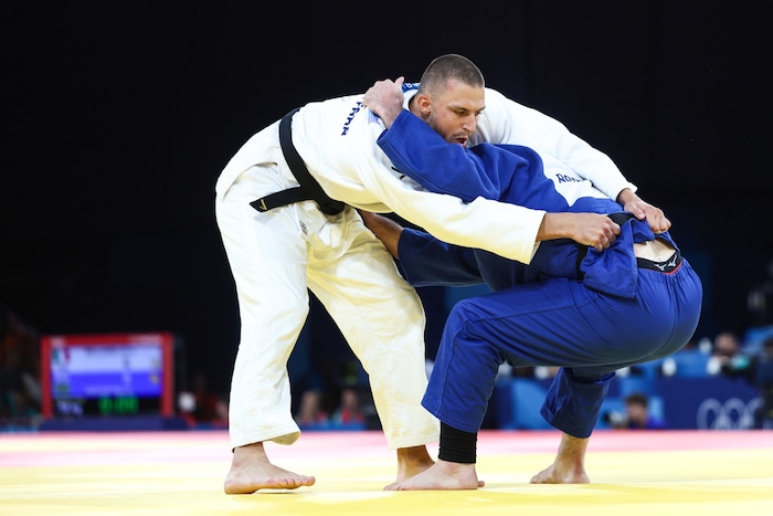 Judoka Aaron Fara (left) has great potential as a wrestler.