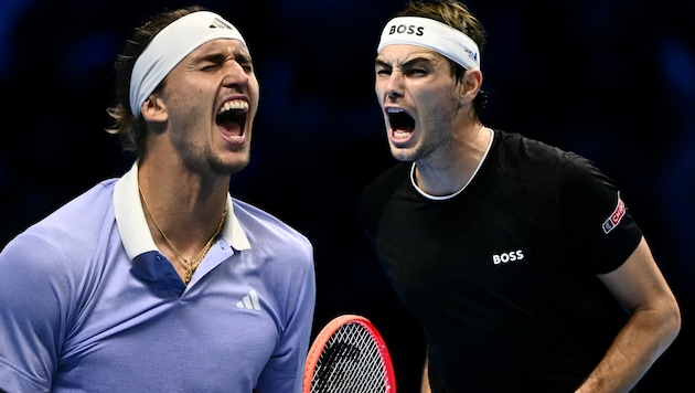 Alexander Zverev (left) meets Taylor Fritz (Bild: AFP/Marco BERTORELLO)