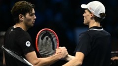 Taylor Fritz (l.) trifft auf Jannik Sinner (r.) (Bild: AFP/APA/Marco BERTORELLO)