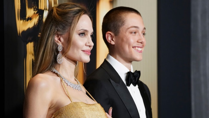 Angelina Jolie posed proudly with her son.