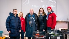 Rapid-Sportdirektor Steffen Hofmann, Lea Laubenthal (Caritas), Clemens Braun, Elisabeth Overbeeke (Rapid) und Caritas-Direktor Klaus Schwertner (v. li.). (Bild: SK Rapid | Widner)