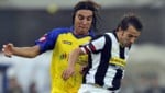 Simone Bentivoglio (links/als Aktiver im Dress von Chievo Verona) (Bild: AFP)