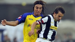 Simone Bentivoglio (links/als Aktiver im Dress von Chievo Verona) (Bild: AFP)