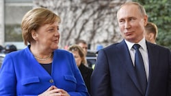 Merkel prägte gemeinsam mit Putin über Jahre das internationale Politparkett.   (Bild: AFP/John MACDOUGALL)