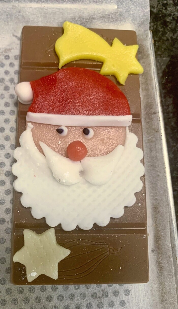 The chocolate Santa Claus also wishes you a Merry Christmas.