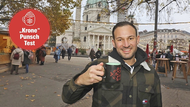 „Krone“-Redakteur Christoph Engelmaier durfte Punsch am Bio-Adventmarkt Karlsplatz testen. (Bild: Krone KREATIV/Martin Jöchl)