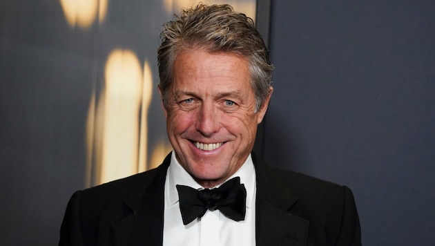 Hugh Grant has probably kissed many women - but he doesn't really want to remember one story. (Bild: picturedesk.com/Jordan Strauss / AP)