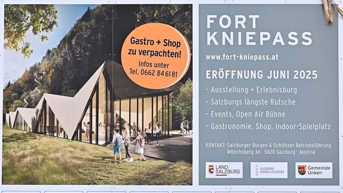 A construction board shows the finished project.