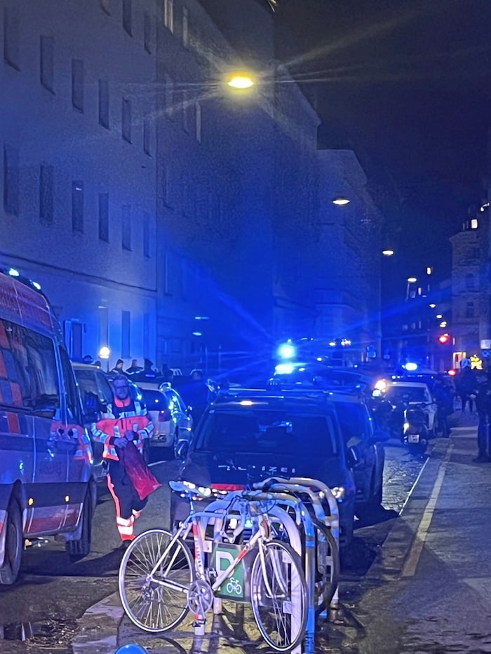 A large police force is on the scene.