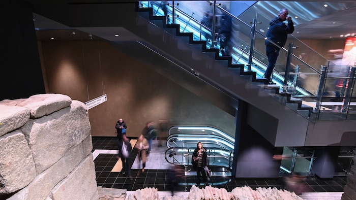 Escalators take you past the city's history.