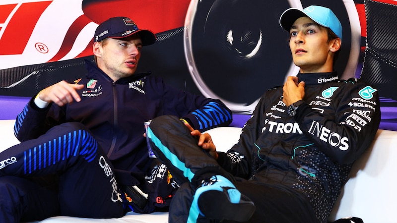 Max Verstappen (left) and George Russell (Bild: AFP/APA/Getty Images via AFP/GETTY IMAGES/CLIVE ROSE)