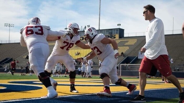 Joe Ashfield (right) also coached at Stanford University