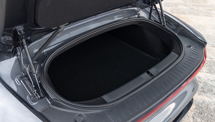 The trunk extends far below the soft-top compartment.