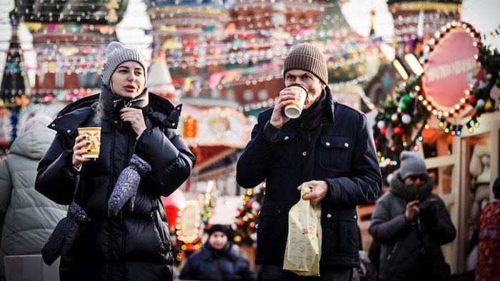 Many are looking for a distraction from everyday life in Russia at the Christmas market on Red ...