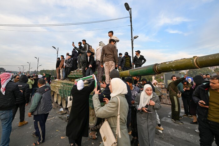 Shots of joy could be heard in Damascus, some danced and asked God to bless the new Syria.