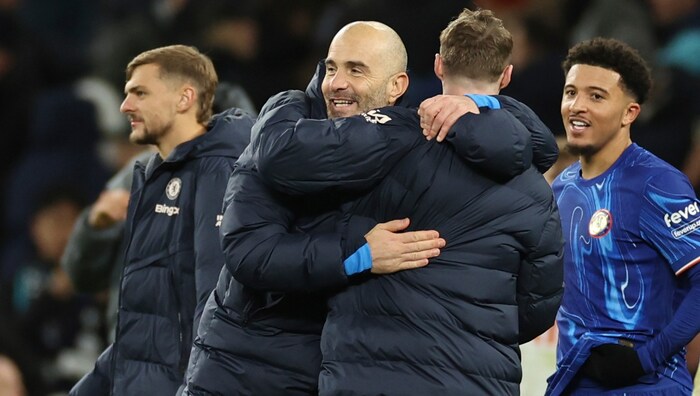 Enzo Maresca (2nd from left) embraces Cole Palmer.