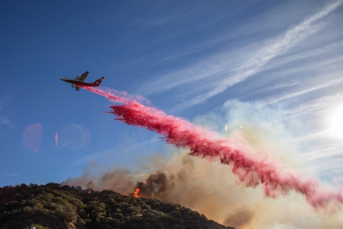 The flames were spread quickly by strong Santa Ana winds, which occur mainly in the fall and ...