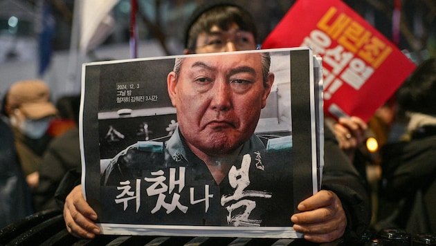 South Korea is deeply divided politically. (Bild: AFP/ANTHONY WALLACE)