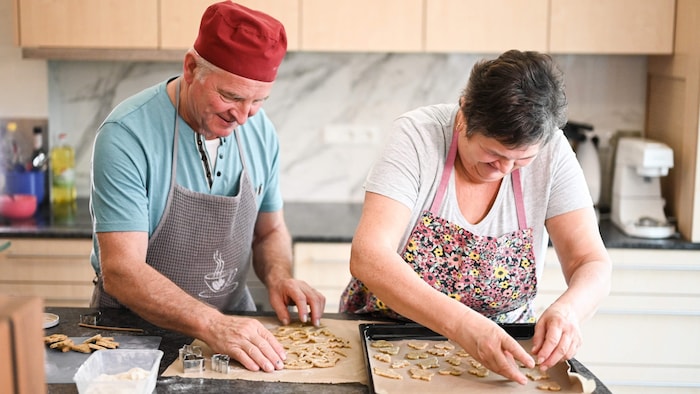 The two of them get busy in the kitchen.