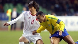 Li Tie (links) spielte einst für das chinesische Fußball-Nationalteam und wurde nun wegen ...