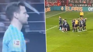 Bochum-Goalie Patrick Drewes, der beim Spiel gegen Union Berlin von einem Gegenstand getroffen worden und zu Boden gegangen ist ... (Bild: Sky (Screenshot))