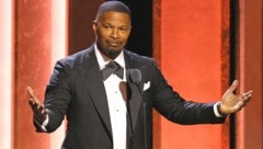 Jamie Foxx wurde während seines Geburtstagsdinners von einem Tischnachbarn mit einem Glas beworfen. (Bild: AFP/Etienne LAURENT)