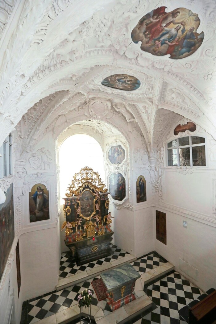 A secret passageway leads to the gallery of the bishop's chapel.